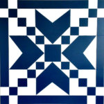 large navy and white barn quilt